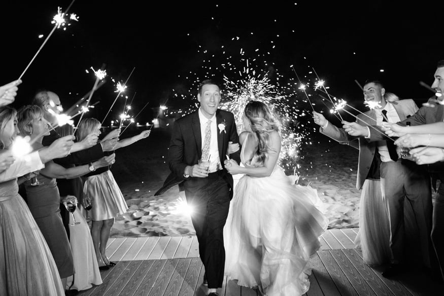 Night portraits with sparklers at Windows on the Water wedding at Sea Bright.